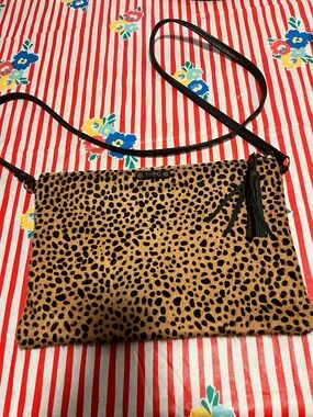 Wild Goose brand leather and calf hair cheetah print crossbody bag